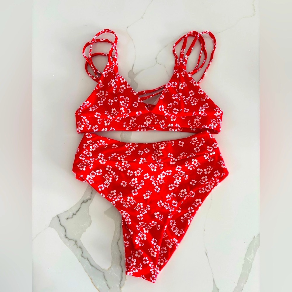 Brand new. Unworn. Kulani Kinis bikini bottoms and two tops. NWT.